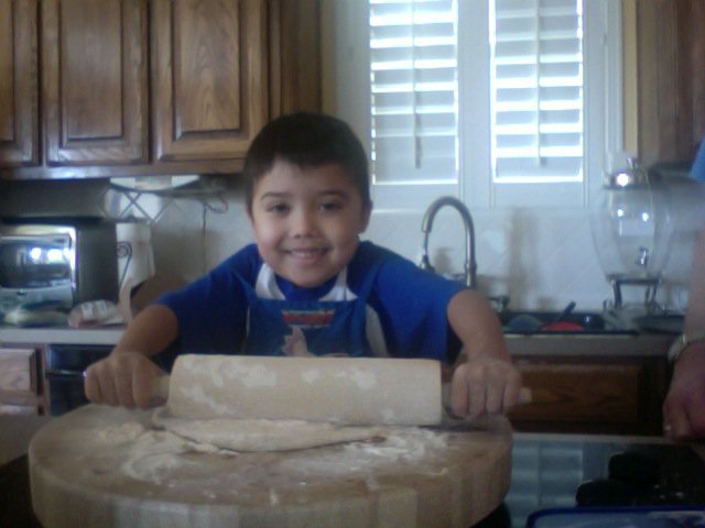 Jude making pizza after going home for a little while. September 2010.