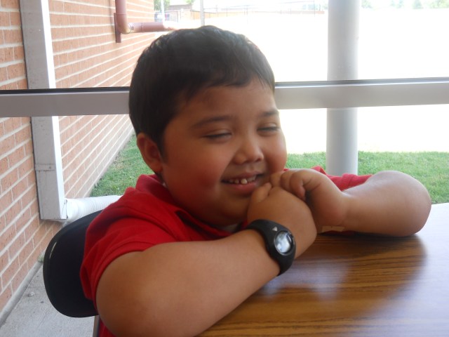 Jude being interviewed for the school newspaper. August 2011.