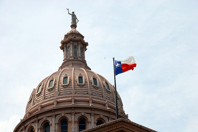 Texas Capitol and flag, taken by Jon Wiley.