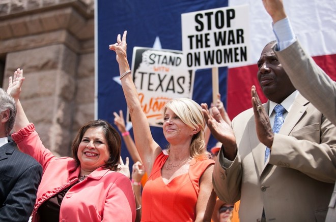 Sen. Leticia Van de Putte and Sen. Wendy Davis at the Stand with Texas Women Rally at the Capitol after the filibuster. (Photo by: Callie Richmond)